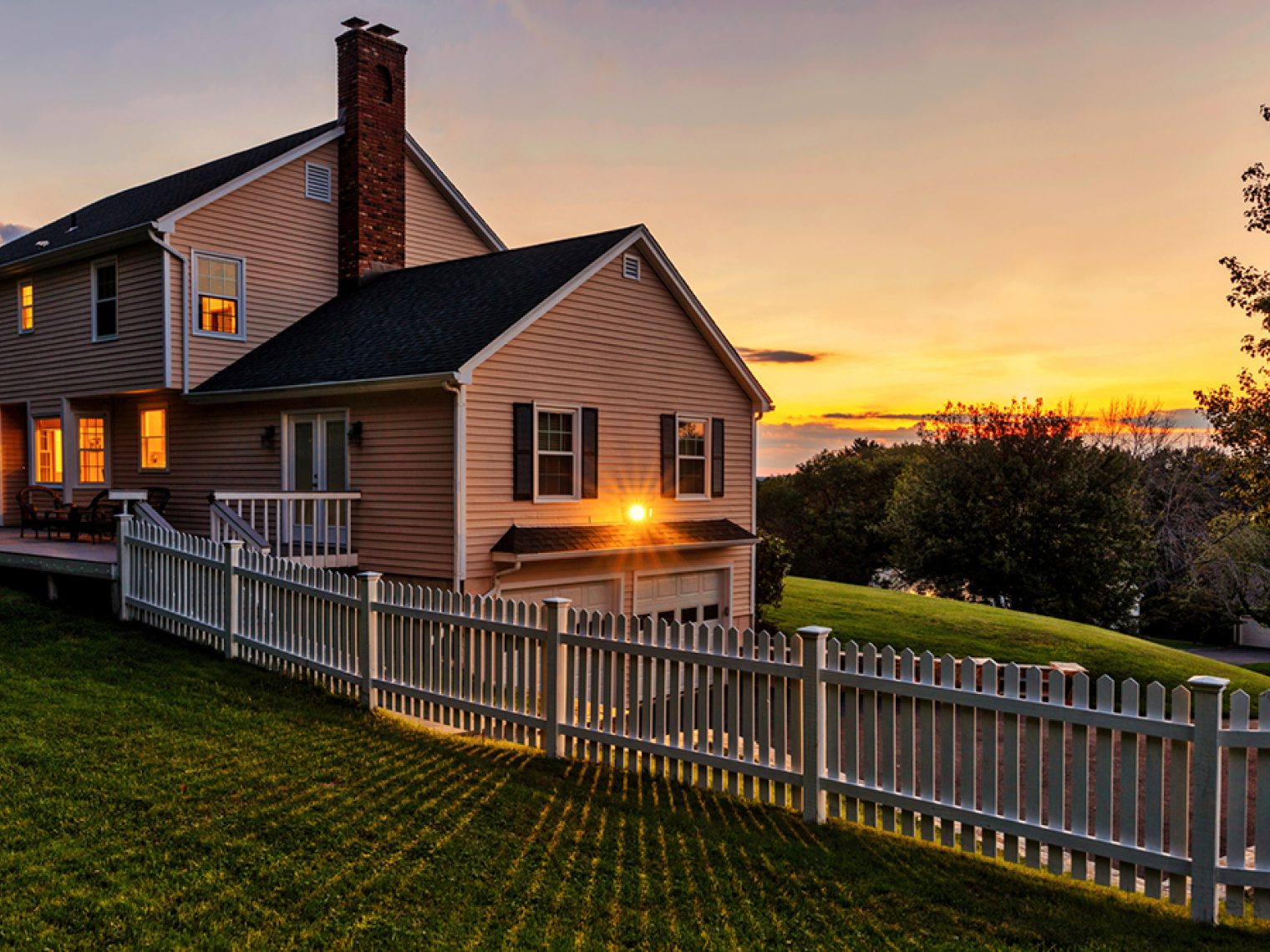 Upscale home at sunset.