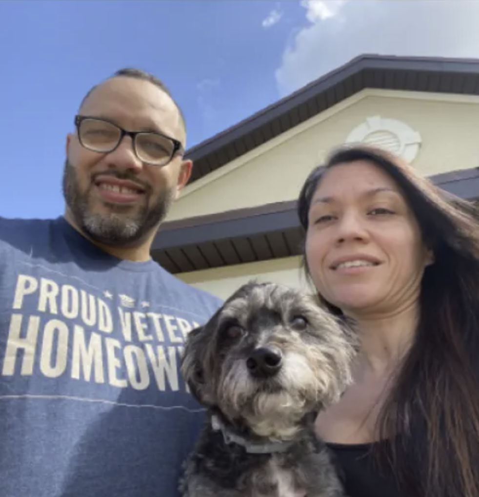 picture of Jose R. in front of a house